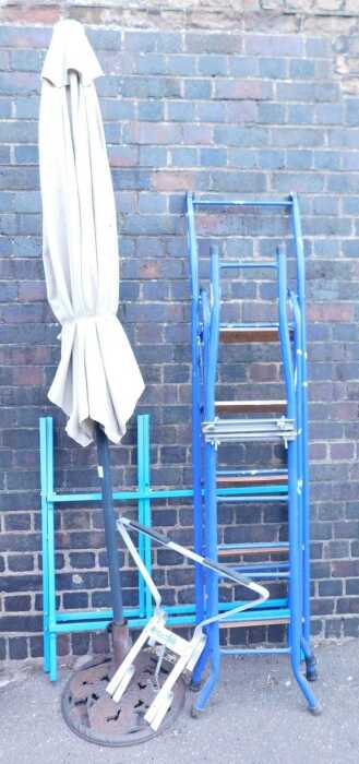 A Roof Link ladder, together with Easy Reach Fits All Ladder ladder stay, a cream canvas...
