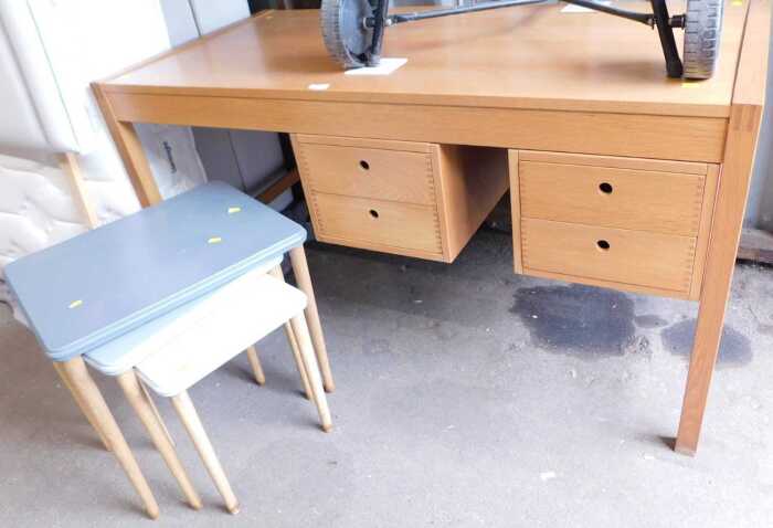 A contemporary oak desk or dressing table, 70cm high, 131cm wide, 64cm deep, together with a...