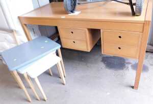 A contemporary oak desk or dressing table, 70cm high, 131cm wide, 64cm deep, together with a...