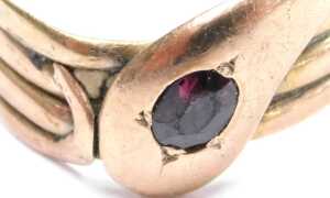 A 9ct rose gold and red stone set serpent ring, size U, 4.5g. - 2