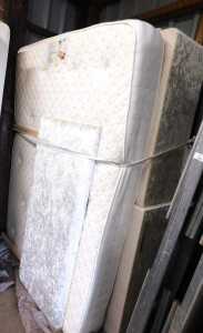 A double bed, comprising a grey valour upholstered headboard, a Deluxe Beds Memory Flex mattress,...