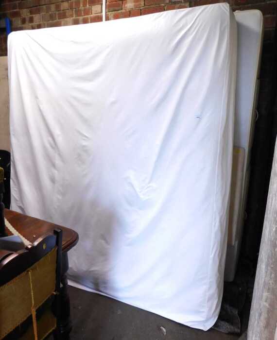 A kingsize bed, comprising mattress and divan bed base.