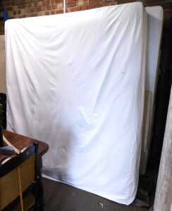 A kingsize bed, comprising mattress and divan bed base.