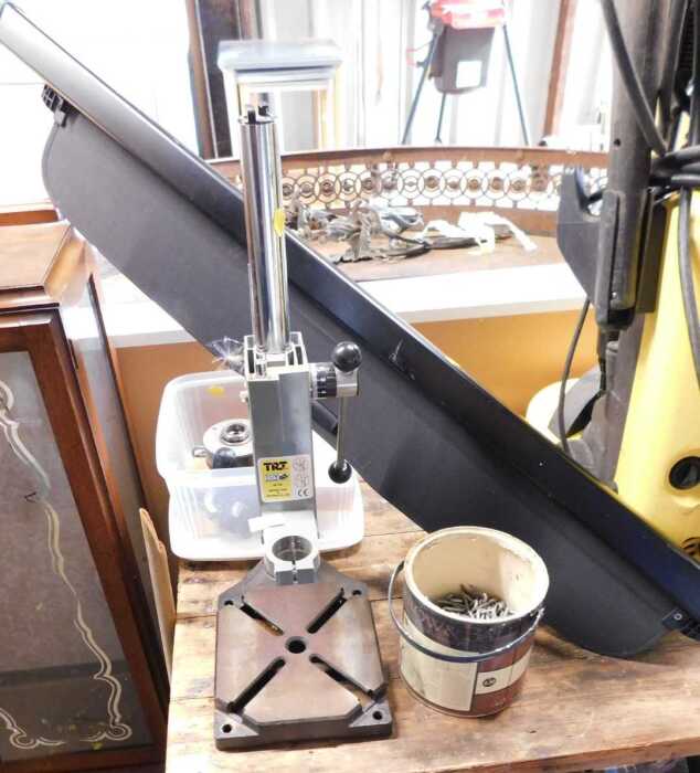 A TRT drill stand, together with various attachments, a box containing nails, etc. (a quantity)