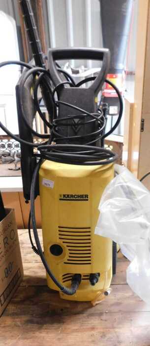 A Karcher pressure washer.