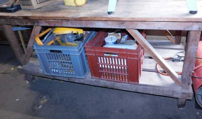 A wooden two tier work bench, 75cm high, 153cm wide, 68cm deep, together with a workman's visor,...