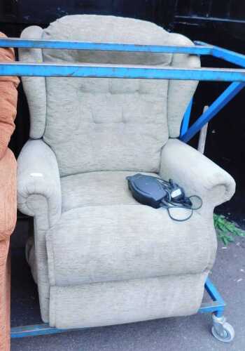 An electric reclining armchair.