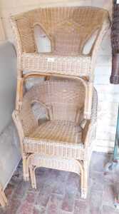 Three wicker tub chairs.