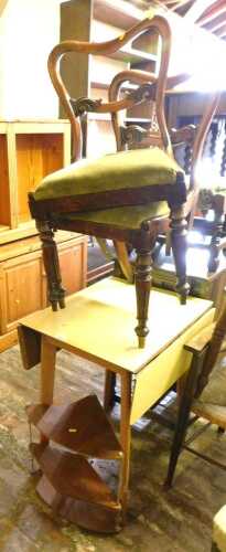 A mid century melamine topped drop leaf kitchen table, 79cm high, 61cm wide, together with a...