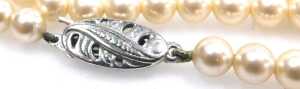 A string of graduated cultured pearls, on a lobster claw clasp, stamped 375, and two strands of... - 6