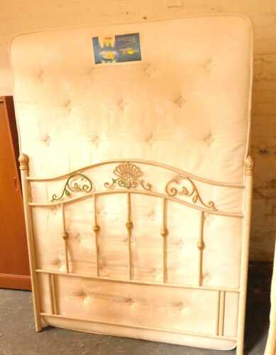 A small double bed, comprising a metal headboard, a Silent Night Mira Coil Supreme Milton...