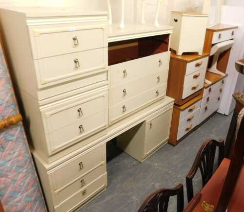 Two part bedroom furniture suites, comprising chest of drawers, side cabinets, etc. (a quantity)...