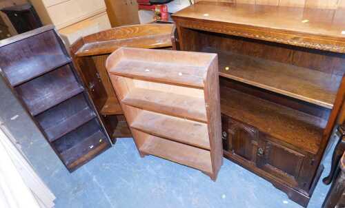 A group of furniture, comprising an Old Charm style bookcases, a wicker bookcase, a pine open...