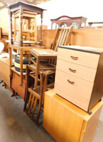 A group of furniture, to include a mid century drop leaf table, oak occasional tables, various...