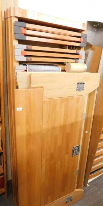 Two Hulsta sleigh beds.