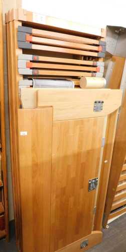 Two Hulsta sleigh beds.