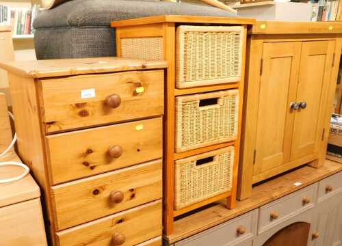 A contemporary oak cabinet, with two panelled doors enclosing a single shelf, raised on stiles,...