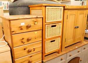 A contemporary oak cabinet, with two panelled doors enclosing a single shelf, raised on stiles,...