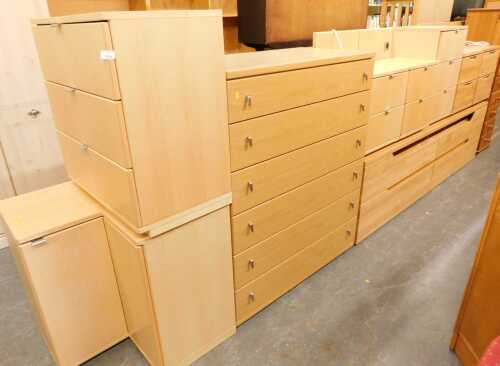 A harlequin bedroom furniture, comprising various chests of drawers, bedside chests, corner two...