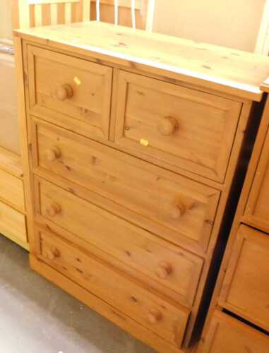 A pine chest, of two short over three long drawers, raised on a plinth base, 101cm high, 75cm...