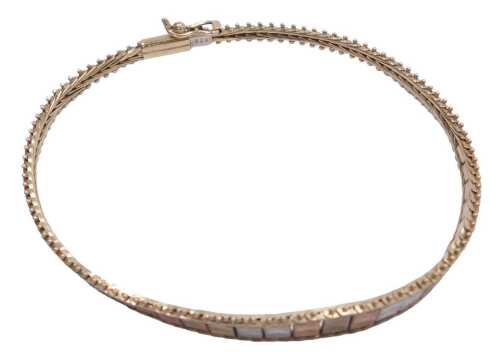 A 9ct three colour gold fringe bracelet, on a snap clasp, 5.3g.