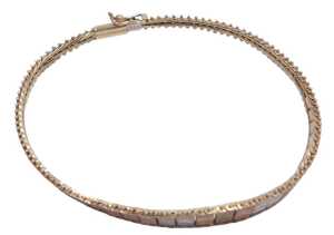 A 9ct three colour gold fringe bracelet, on a snap clasp, 5.3g.