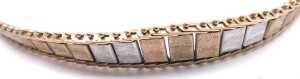 A 9ct three colour gold fringe bracelet, on a snap clasp, 5.3g. - 2