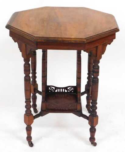 A Victorian rosewood hexagonal topped window table, raised on turned legs united by an undertier.