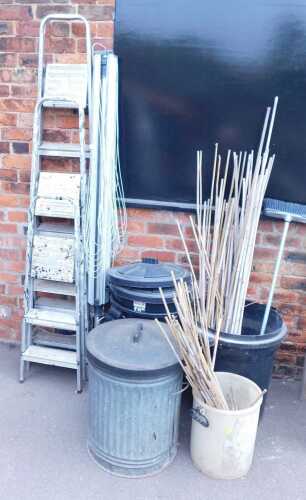 An outdoor collapsible rotary airer, together with a galvanised steel dustbin, and plastic...