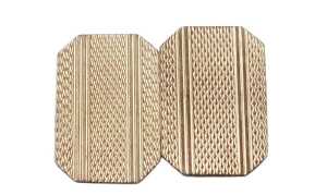 A 9ct gold double rectangular and chain link cufflink, with engine turned decoration, 2.0g.