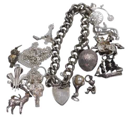 A silver curb link bracelet, on a heart shaped padlock clasp, 0.89oz, together with assorted...