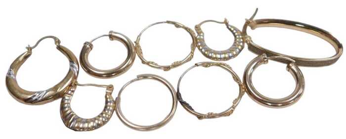 Two pairs of 9ct gold hoop earrings, pair of bicolour gypsy earrings, and single earrings, 3.3g.