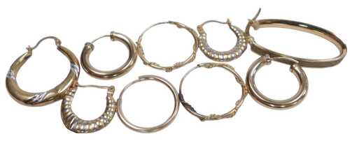 Two pairs of 9ct gold hoop earrings, pair of bicolour gypsy earrings, and single earrings, 3.3g.