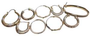 Two pairs of 9ct gold hoop earrings, pair of bicolour gypsy earrings, and single earrings, 3.3g.