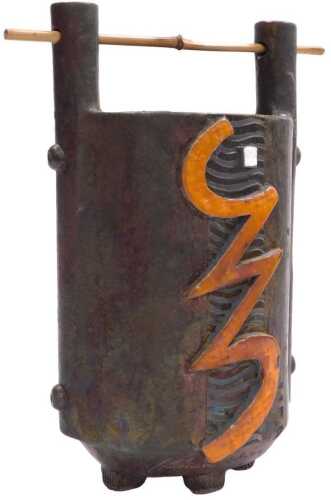 A late 20thC Studio pottery vase, possibly Japanese, of oval form, with a bamboo carrying handle,...