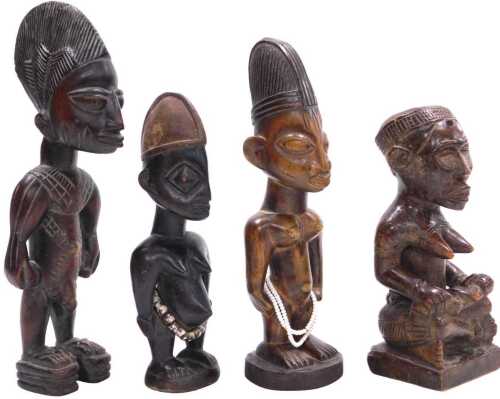 A Nigerian Yoruba, carved wooden figure of an Ere Ibeji man, 30cm high, a Democratic Republic of...