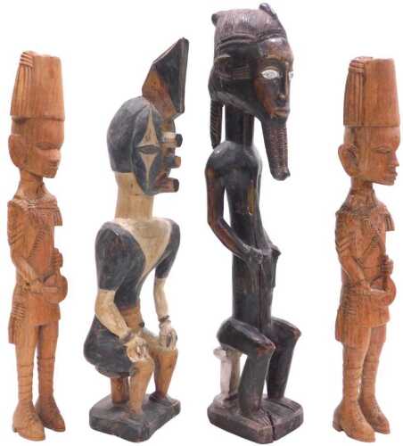 A pair of West African Kamba Askari figures, modelled as King's African riflemen, 39cm high, and...