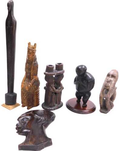 An African Tribal carving of the Virgin Mary, of elongated form, 42cm high, a Benin style figure...
