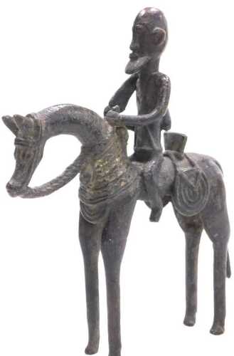 A Mali Dogon bronze figure, of a warrior on horseback, 20cm high.