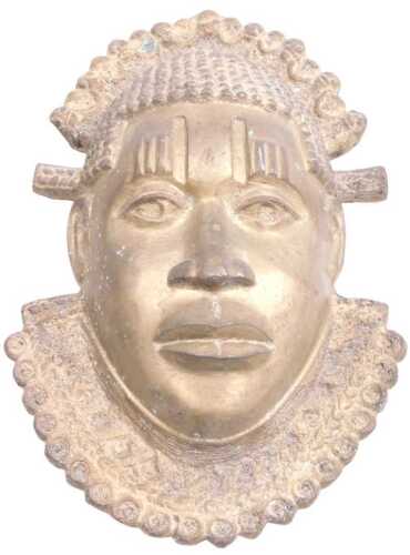 An Ebonyeen bronze tribal mask, cast wearing a fancy headdress and collar, 30cm high.