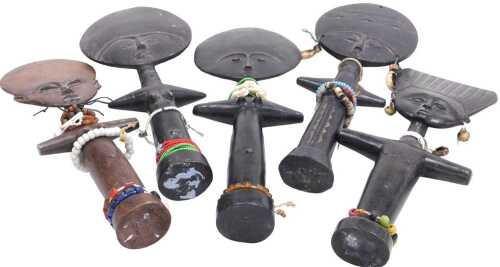 A group of Ghana Akuaba carved wooden fertility dolls, adorned with beads, some of glass, shells...