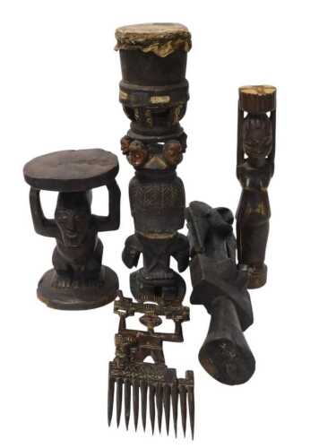 An Ashanti carved wooden hair comb, 35cm high, a Central African Luba stool, a totem carving, an...