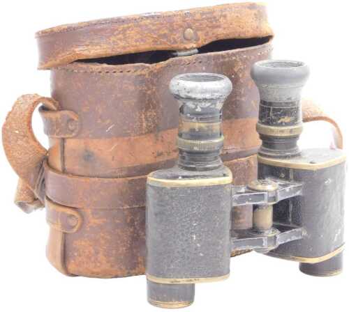 A pair of WWII military binoculars, serial number S1.M6861, cased.