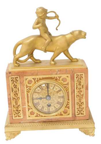 A late 19thC German marble and ormolu mantel clock, circular brass dial bearing Roman numerals,...