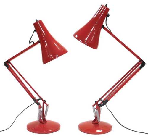 A pair of Anglepoise model 90 red table lamps.