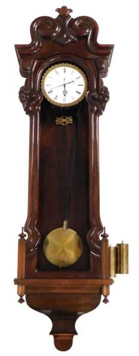 A late 19thC annual wind mahogany cased Vienna wall clock, by Johann W&ouml;rle, in Wien, circular...
