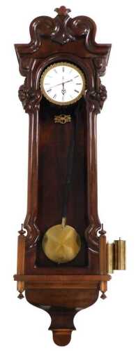 A late 19thC annual wind mahogany cased Vienna wall clock, by Johann W&ouml;rle, in Wien, circular...