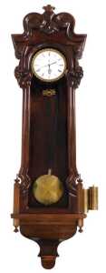 A late 19thC annual wind mahogany cased Vienna wall clock, by Johann W&ouml;rle, in Wien, circular...