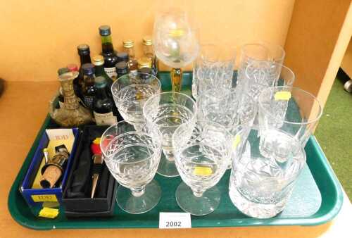 Miniature alcohol and glassware, to include Bailey's, Harvey's Bristol Cream, Grand Marnier, two...