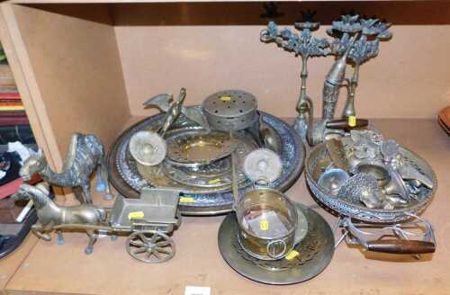 Metalwares, to include brass and steel metal plates, heron brass ornaments, candlesticks, brass...